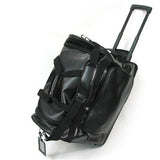 Full view of the traveller bogu bag with the handle extended.